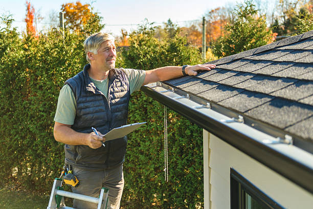 Professional Hail Damage Roof Repair technician working in Doon, IA